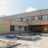 Ersatz- und Erweiterungsbau der St. Michael Grundschule in Holzbauweise mit Schulhof und Eingangsbereich